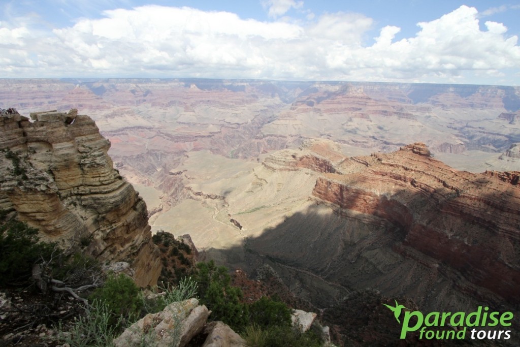 Clouds flirt with the rock formations of Mather Point at the Grand Canyon South Rim