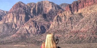 A tourist takes in the amazing view of Red Rock Canyon